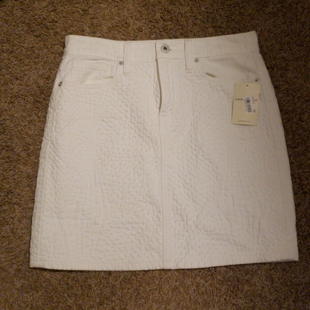 White cotton Lucky mini skirt.